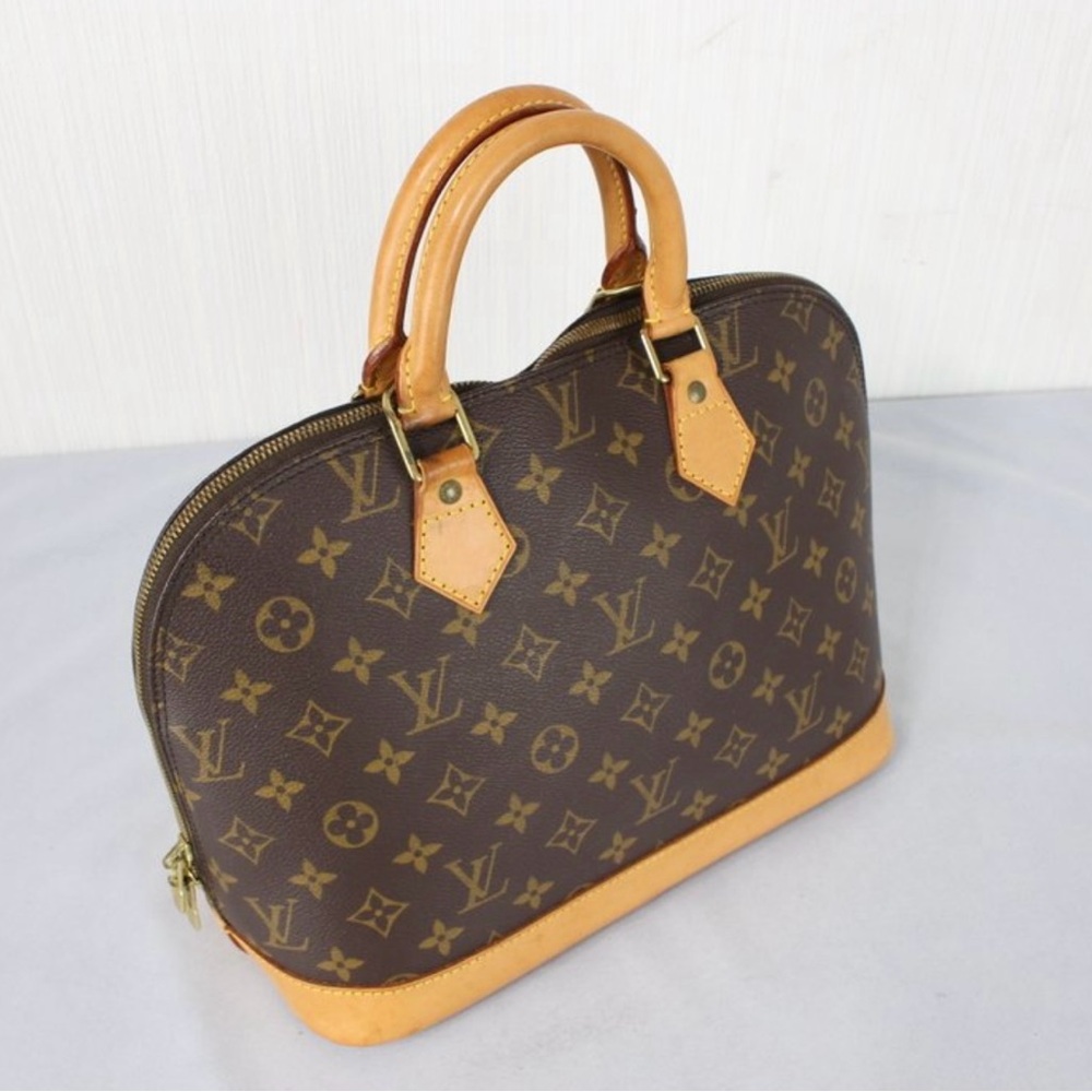 Louis Vuitton  1900.2000 Alma en muy buen estados